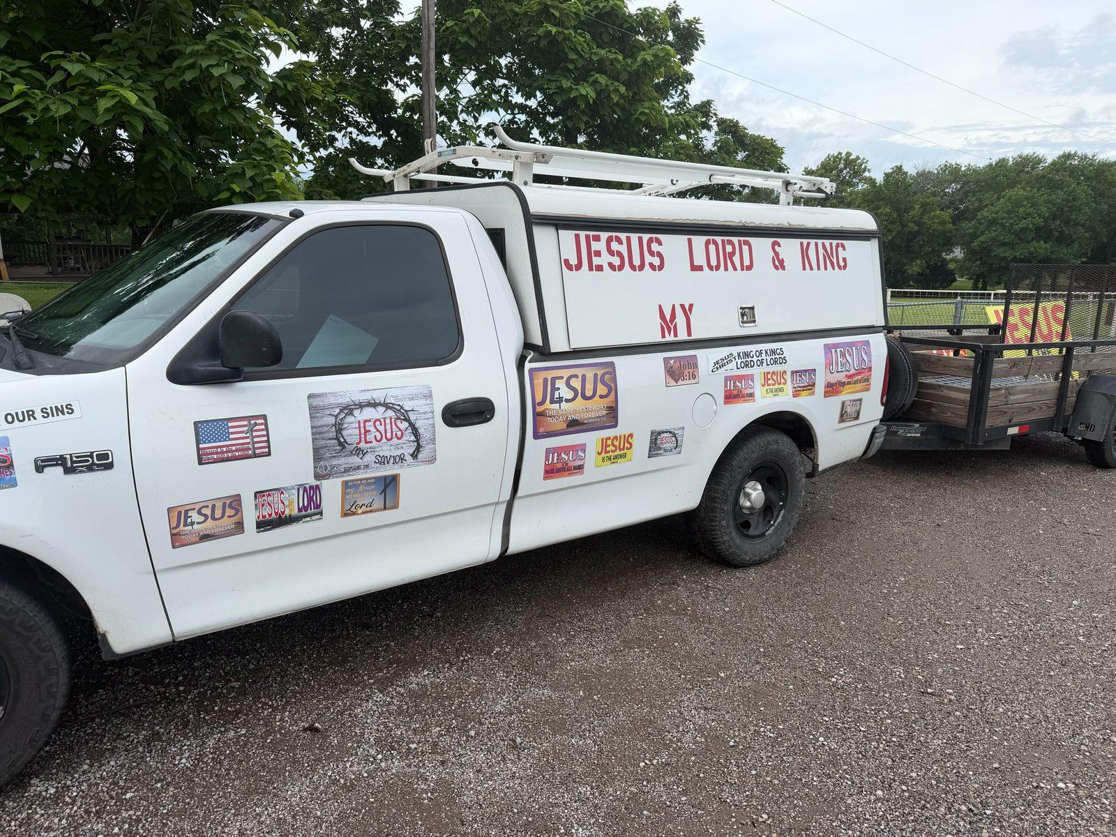 The Banners for Jesus ministry truck covered in JESUS magnets towing a trailer in Oklahoma